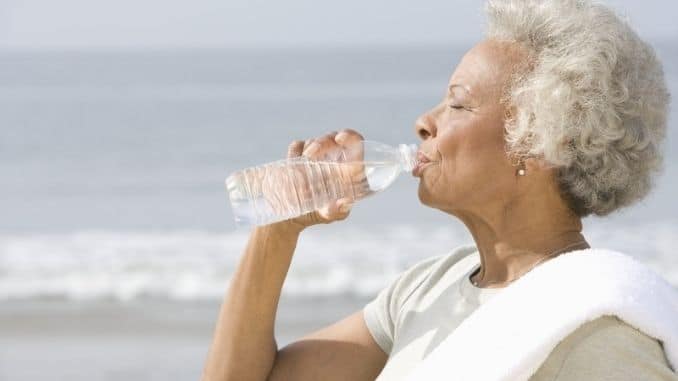 senior-woman-drinking-water