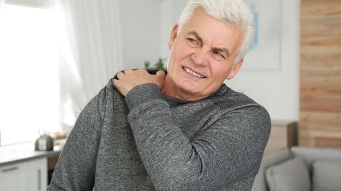 man-scratching-shoulder- Tips to Soothe Senior Itch