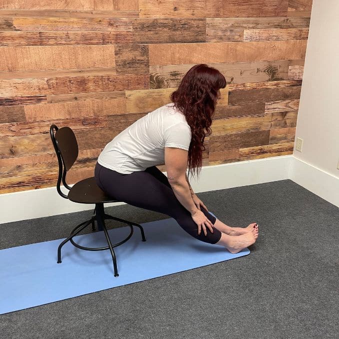 Forward Fold- Chair Yoga Poses for Back Stiffness