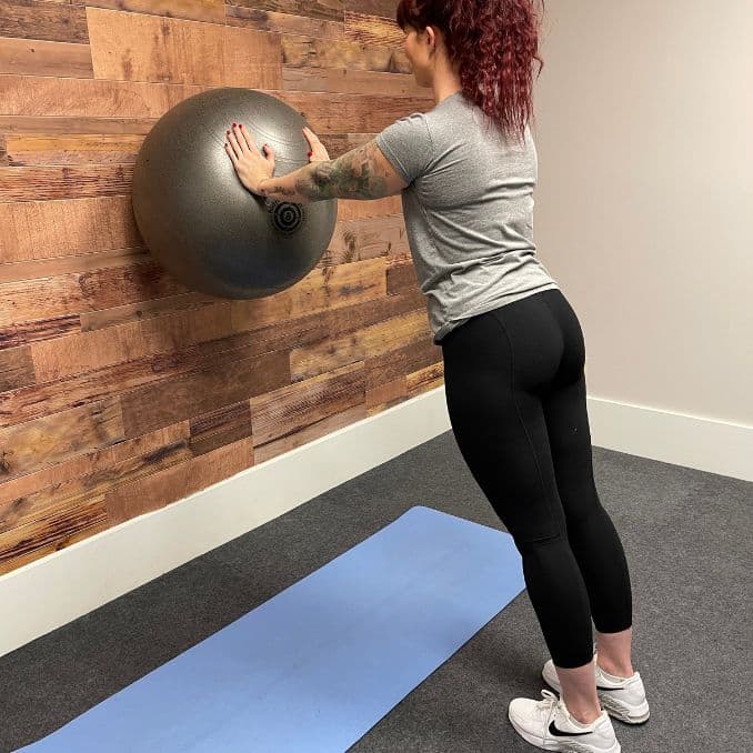 Straight-Arm Wall Plank with Ball