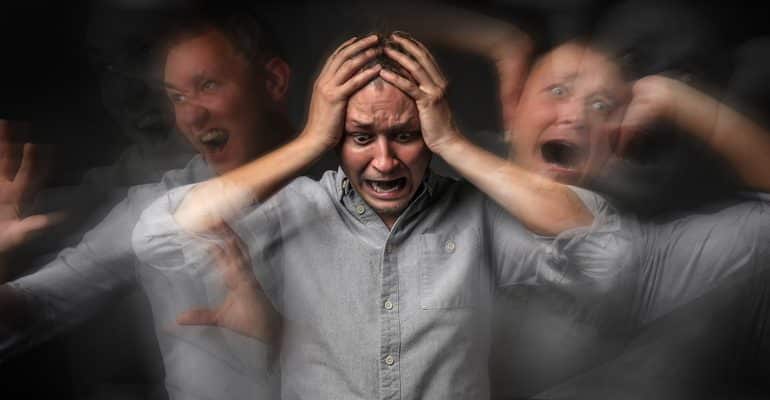 man having panic attack dark background-Deal With A Panic Attack