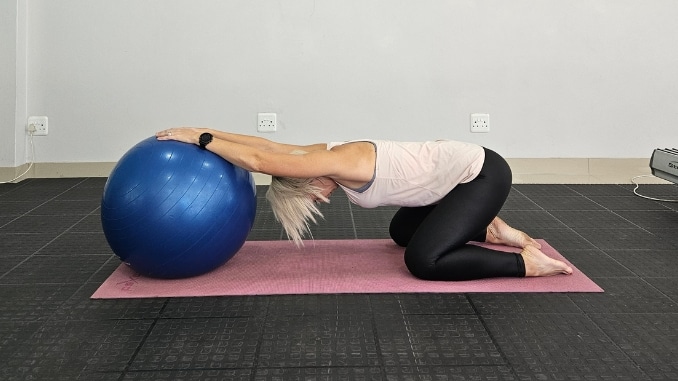 Wide-Legged Child's Pose with Stability Ball