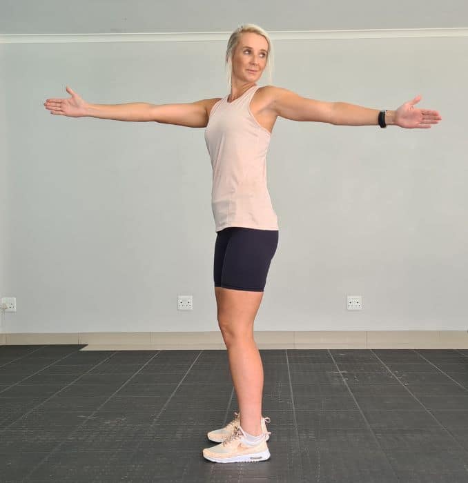 standing twist - end - Resistance Band Stretches